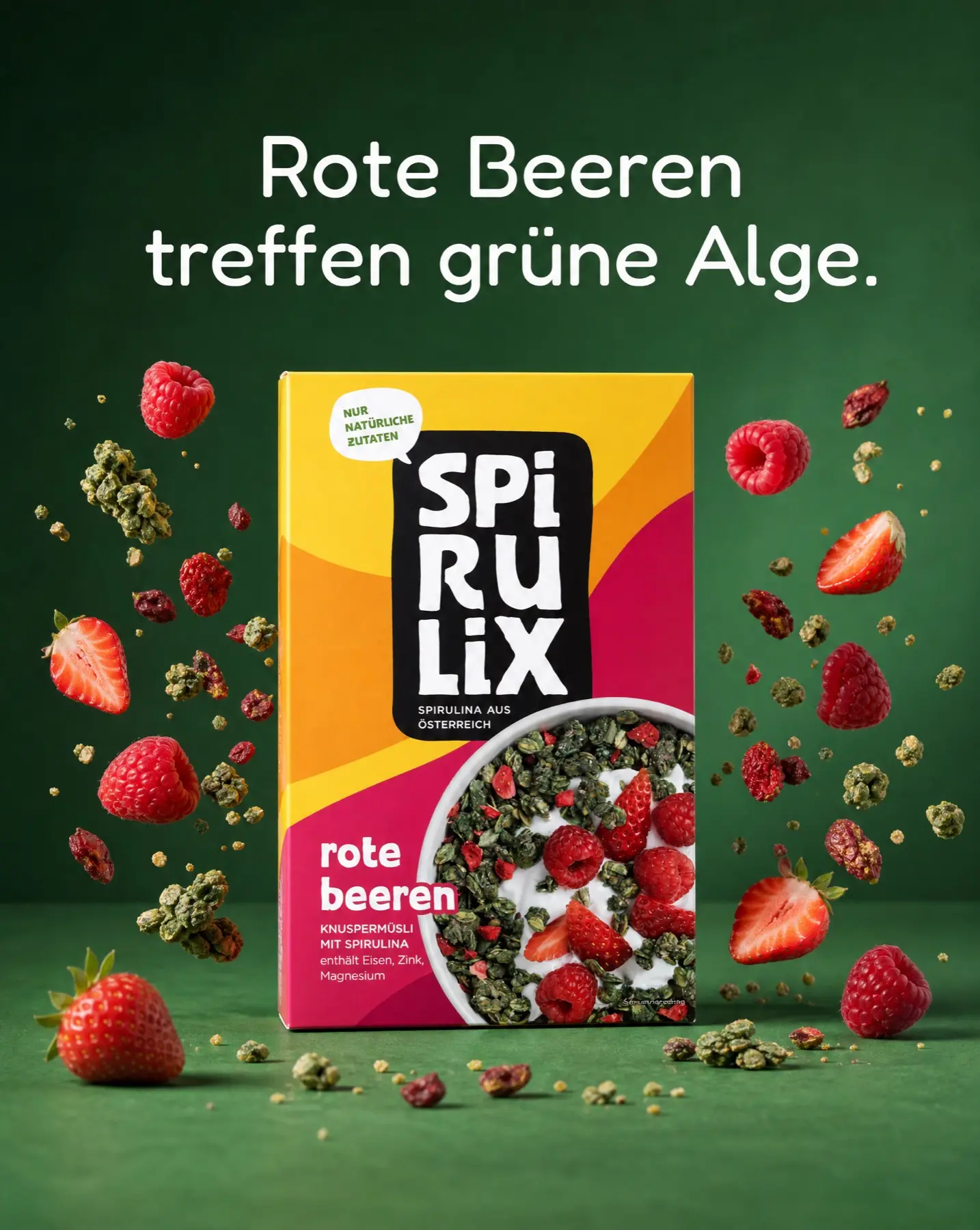 SPIRULIX Rote Beeren muesli box on a deep green field with berries and clusters frozen in mid-air