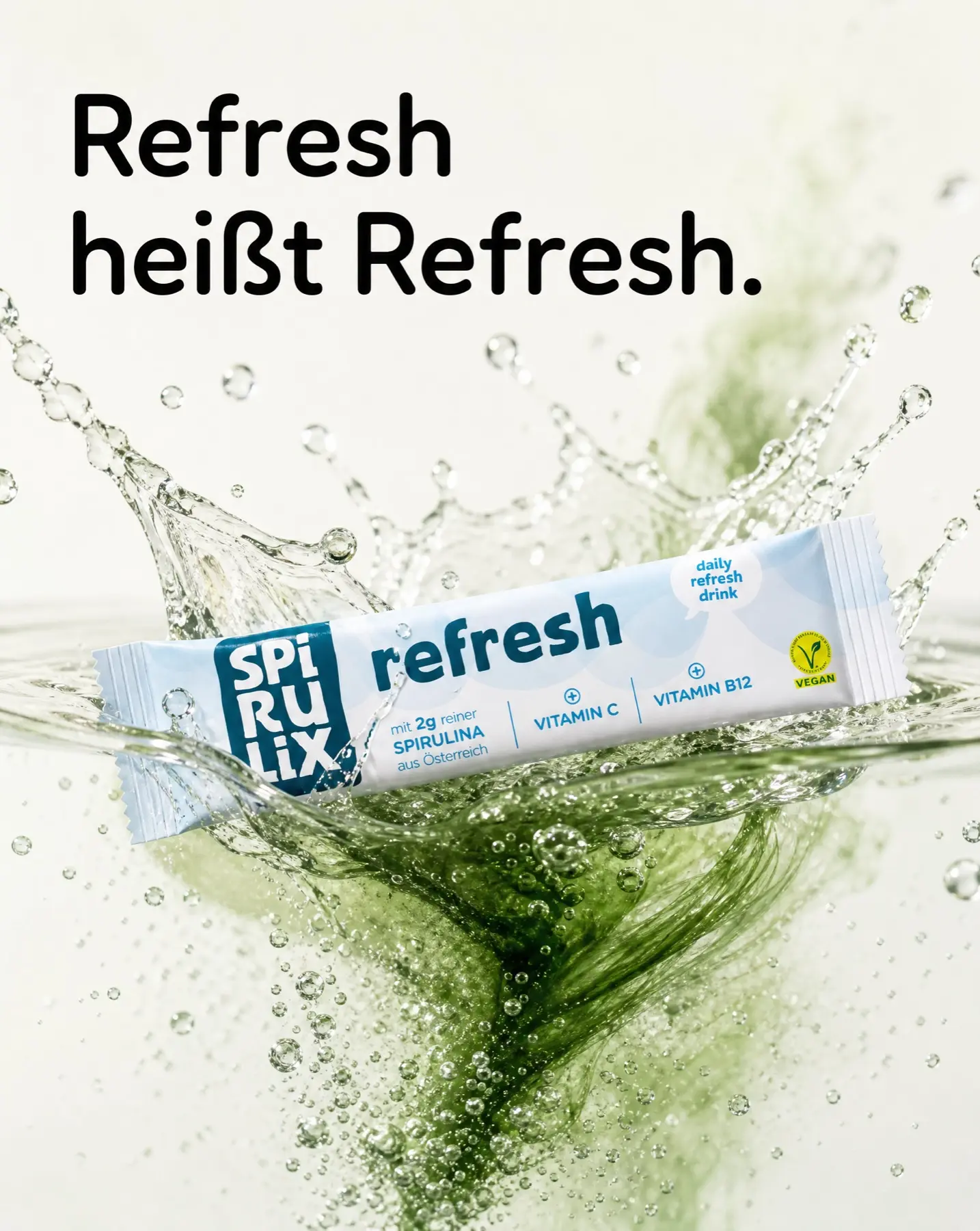 SPIRULIX Refresh stick floating in a green water splash