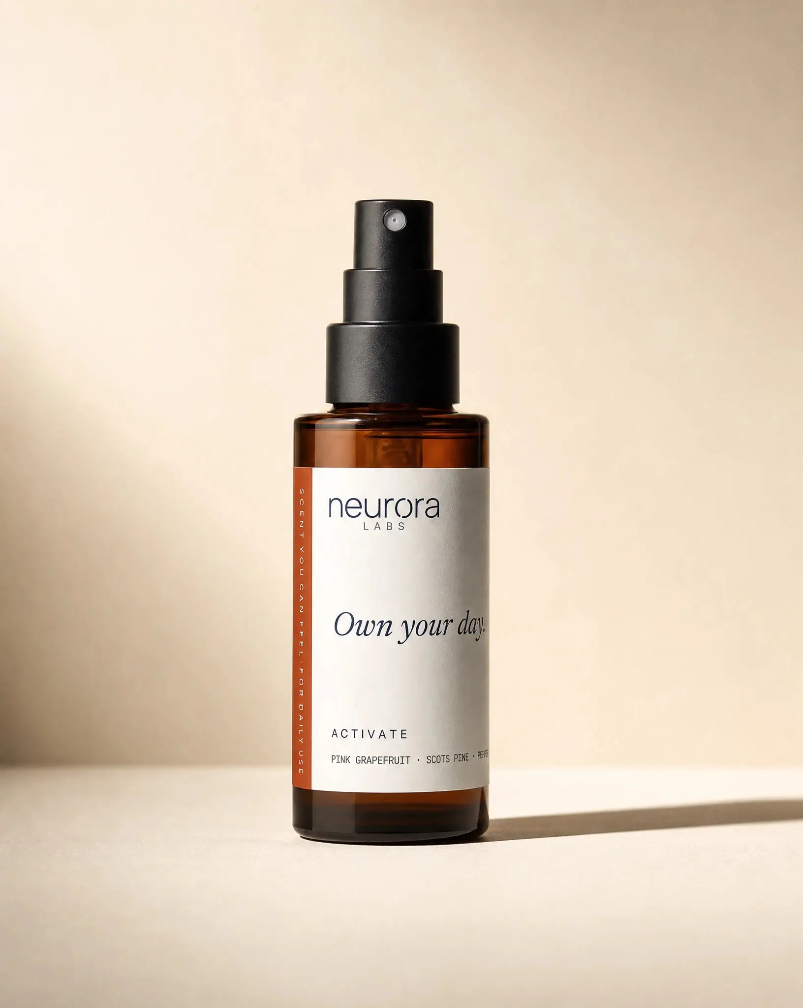 Neurora Activate fabric spray standing in an ecommerce-ready composition