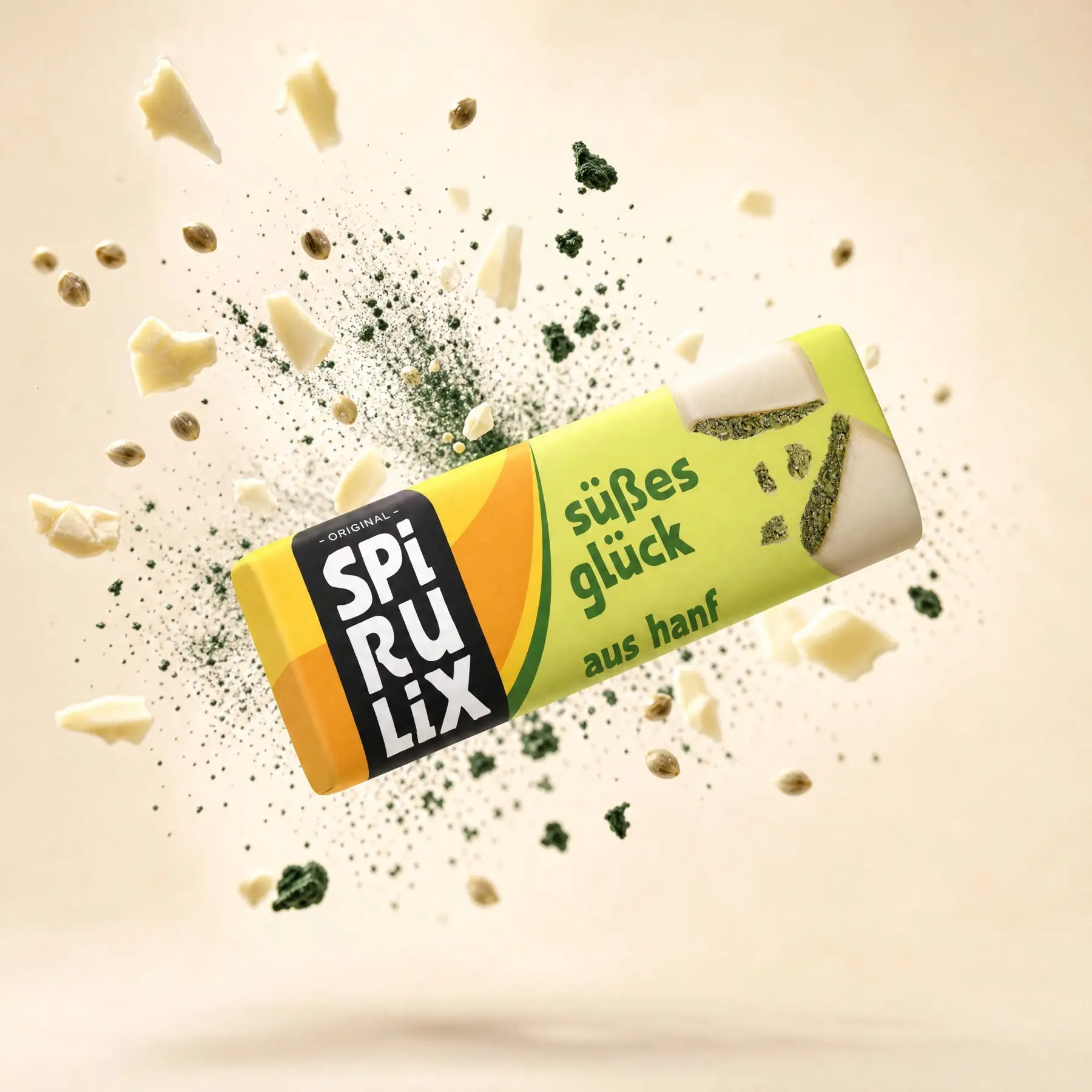 SPIRULIX Süßes Glück hemp bar floating against cream with an ingredient burst behind it